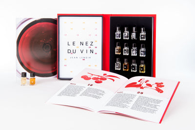 12 red wine aroma vials inside Le Nez du Vin kit — raspberry, cherry, blackcurrant and more