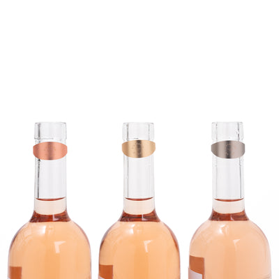 Le Trio Wine Rings on bottle